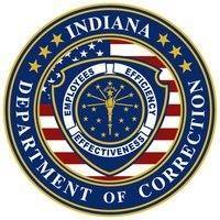Indiana Department of Correction emblem featuring stars and state symbols.