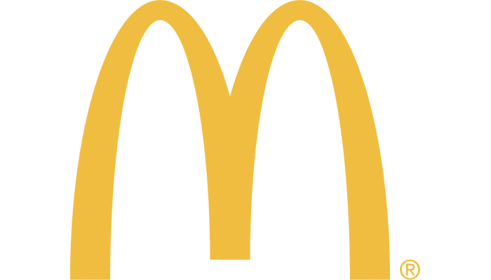 Iconic golden arches logo representing McDonalds fast food brand and restaurants.