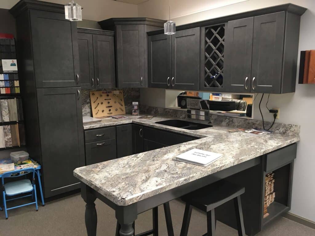 Modern black kitchen cabinets with stylish countertops and sleek appliances for contemporary homes.
