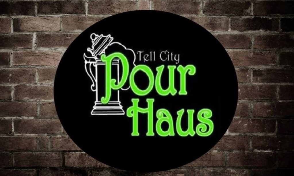 Pour Haus logo showcasing vibrant design for Tell City’s favorite bar.