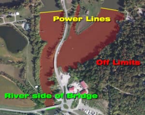 Map showing power lines, off-limits areas, and river side of bridge.