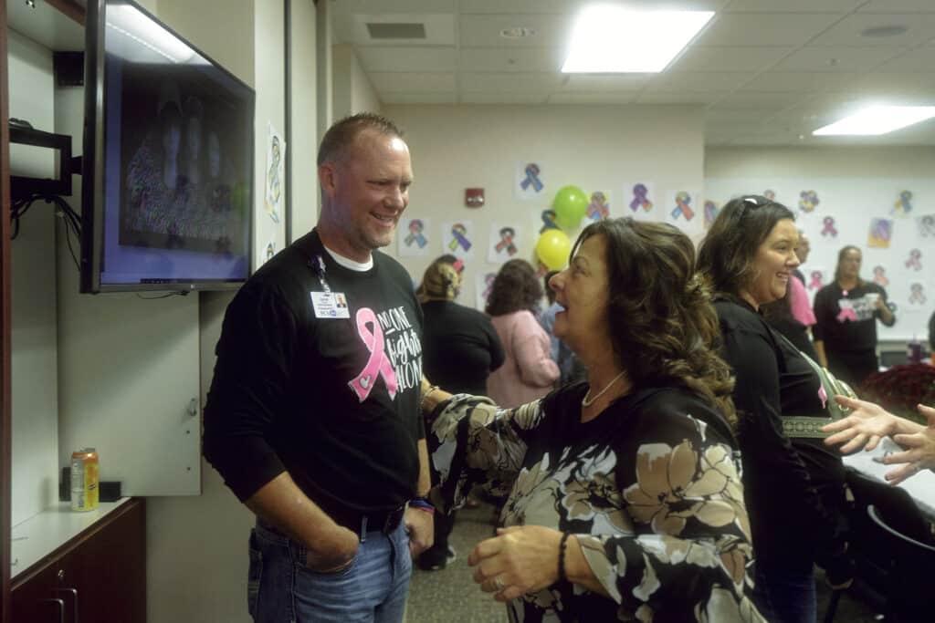 Celebration event in Forest Hills with attendees enjoying and connecting over shared experiences.