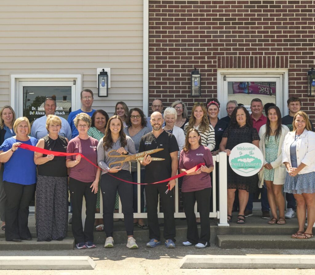 Perry County team celebrates with a ribbon-cutting ceremony at the new location.