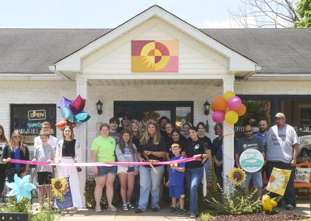 Celebrate the grand opening of Sunny Days Sandwiches with vibrant community and festive decorations.