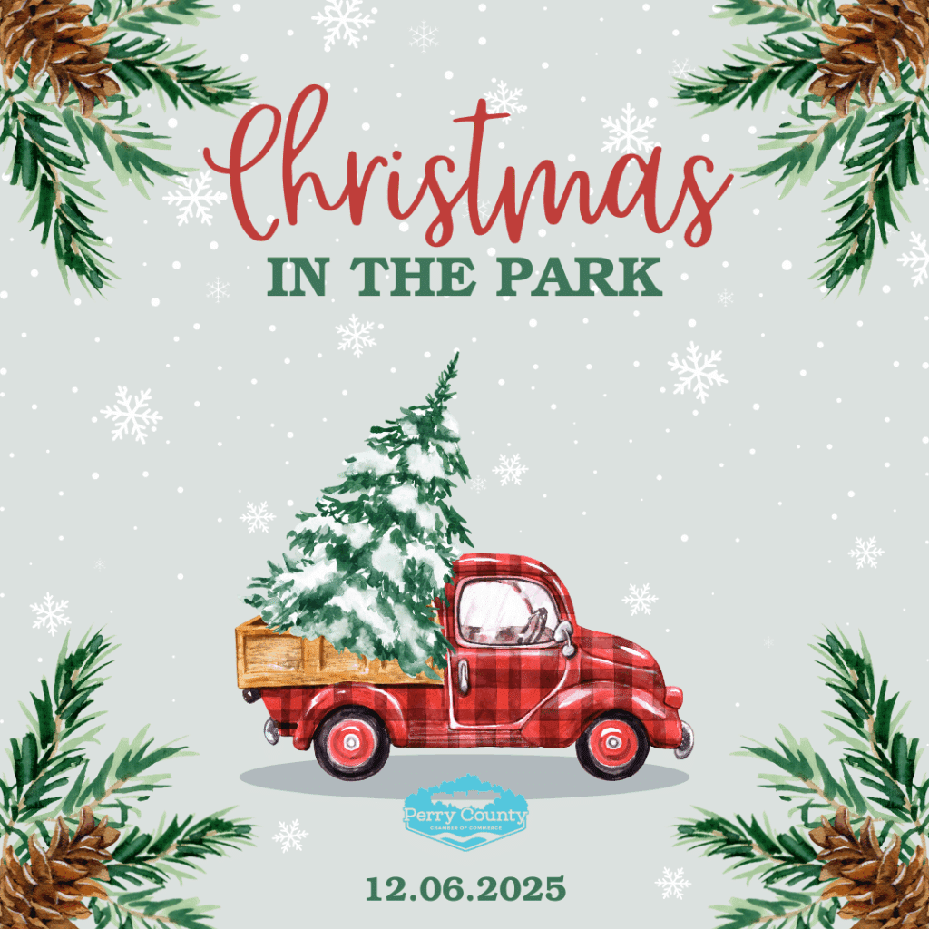 Vintage truck with a Christmas tree for the Christmas in the Park 2025 event.